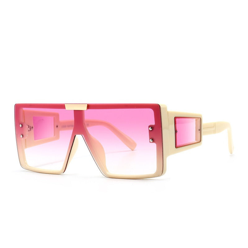 Large frame sunglasses with widened legs and patch sunglasses
